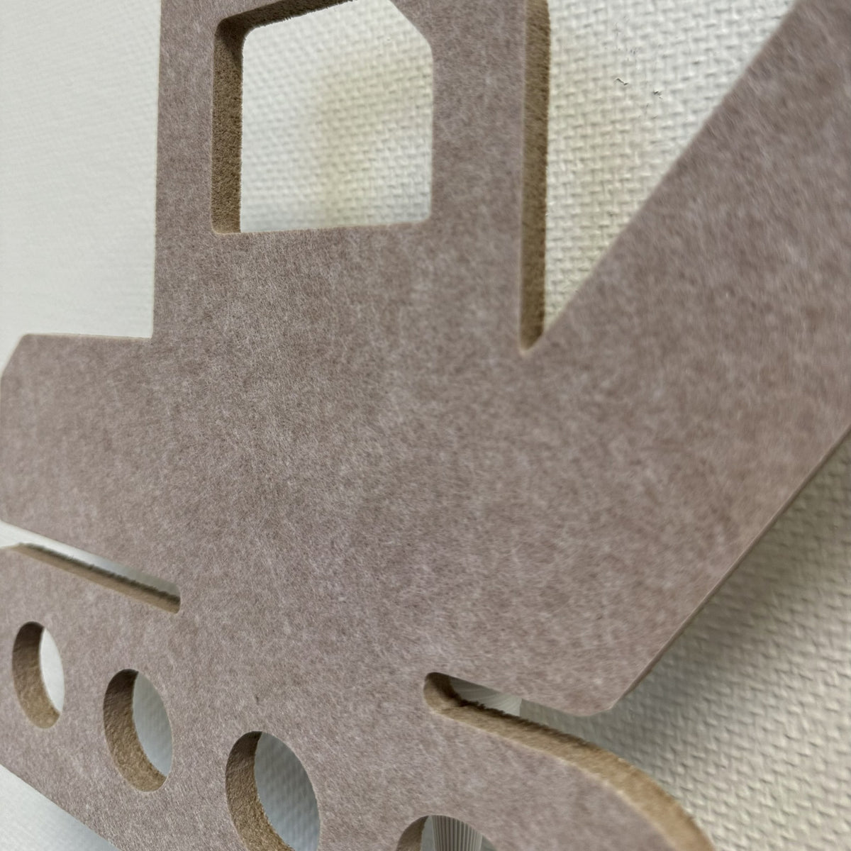 Applique en feutre pelleteuse beige sable – gros plan sur le feutre PET