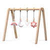 Portique d’éveil en bois blanc, avec les jouets suspendus, le fleur , en bois massif - toddie.fr